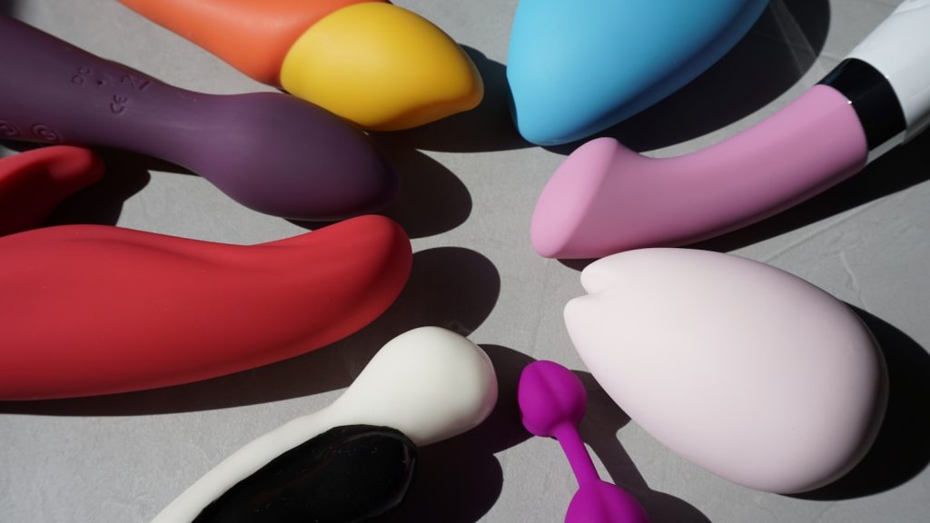 pink yellow blue and whitesex toys