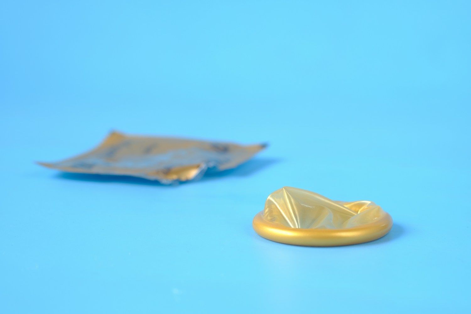 blue paper boat on blue surface